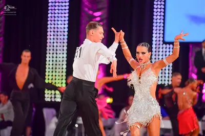 Dancesport competitor #51: Male dancer: white long-sleeve shirt and black trousers