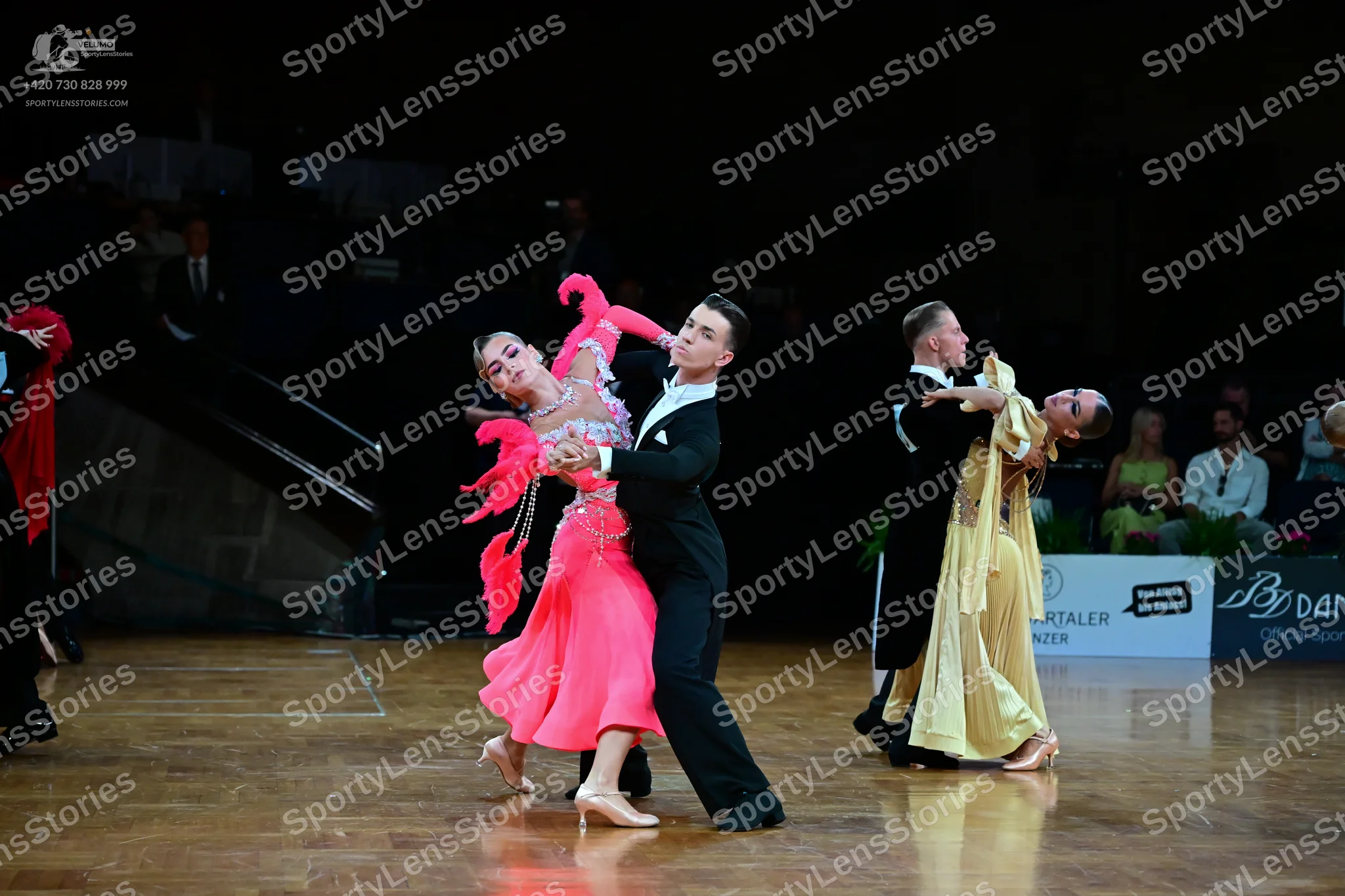Dancesport competitor: Female dancer: pink Latin dress with an embellished bodice