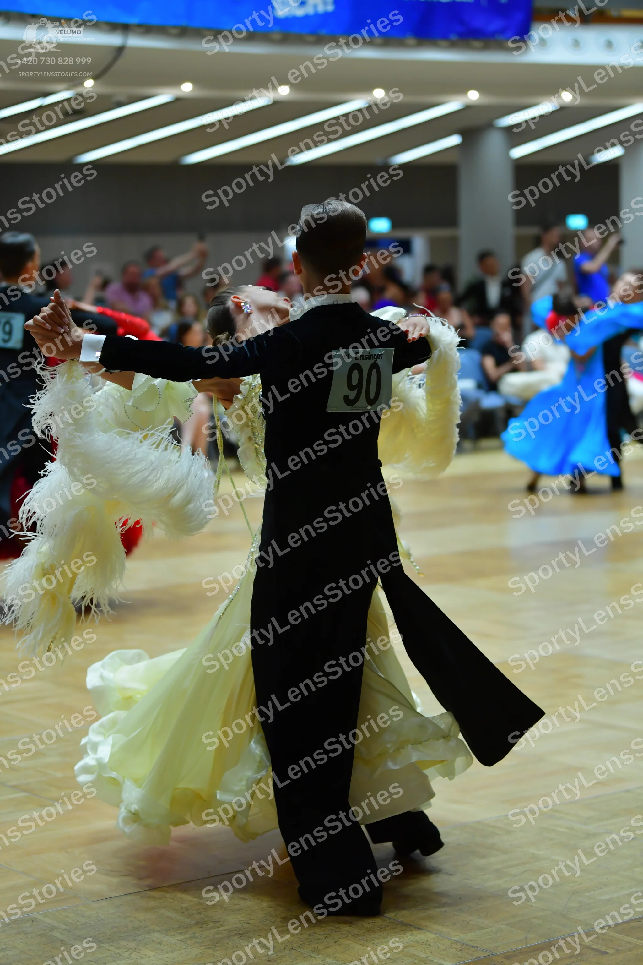 Dancesport competitor #73, #90: Male dancer: black tailcoat