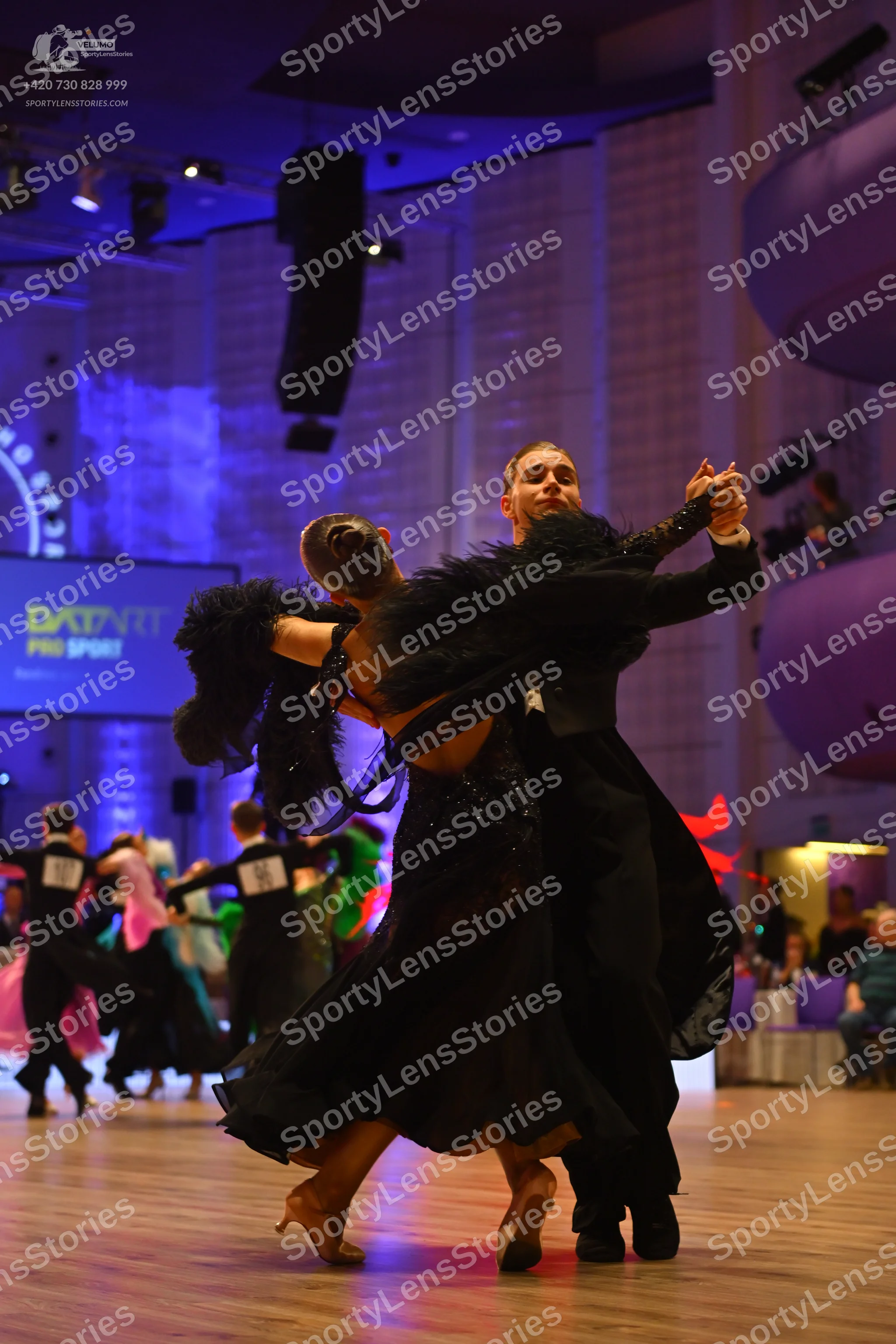 Dancesport competitor: Male dancer: black ballroom tailcoat suit with a white shirt and black bow tie