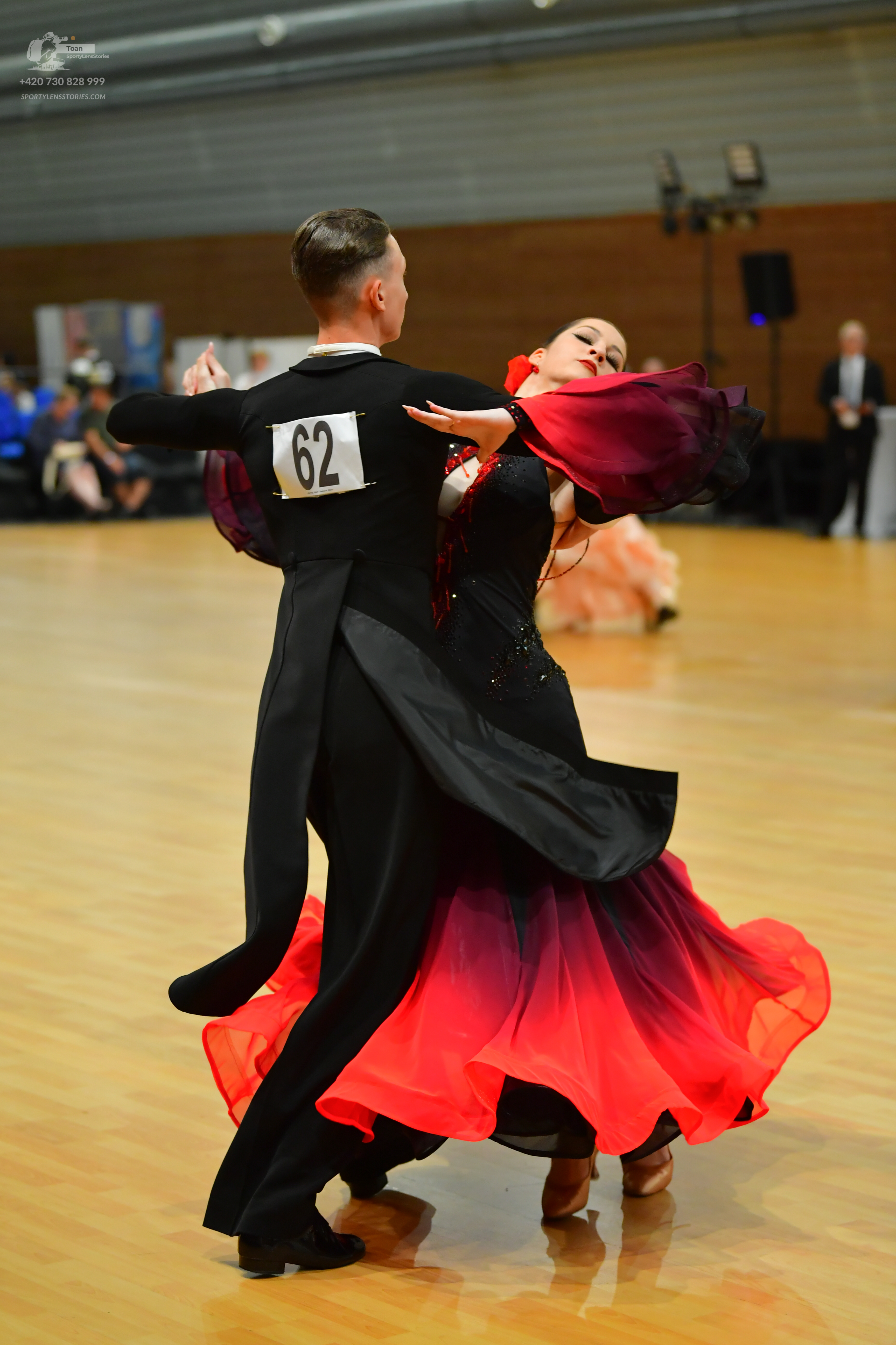 Dancesport competitor #62: Male**
*   **Color:** Black
*   **Fabric:** Sequins
*   **Style:** Tail suit wit