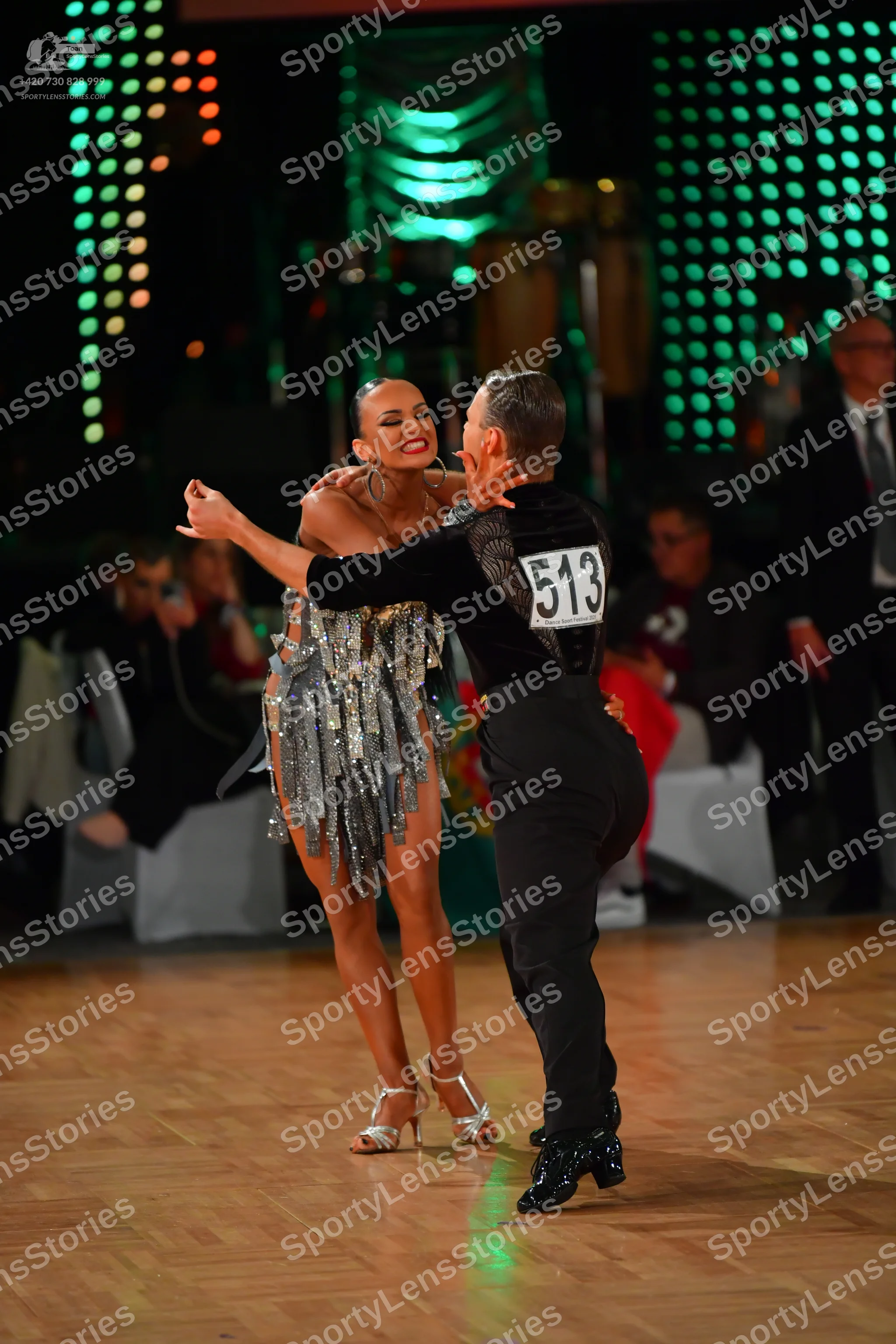 Dancesport competitor #513: Male dancer: black long-sleeved shirt and black trousers