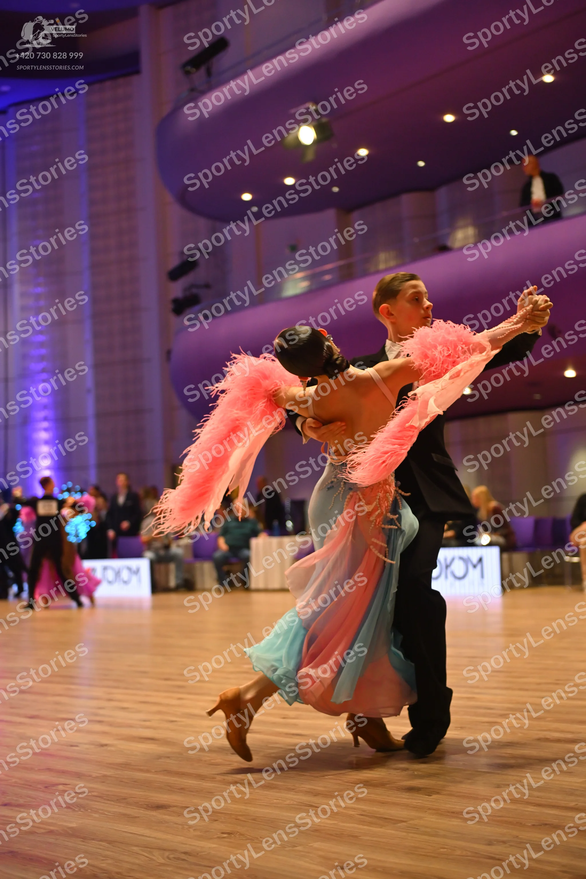 Dancesport competitor: Male dancer: black suit