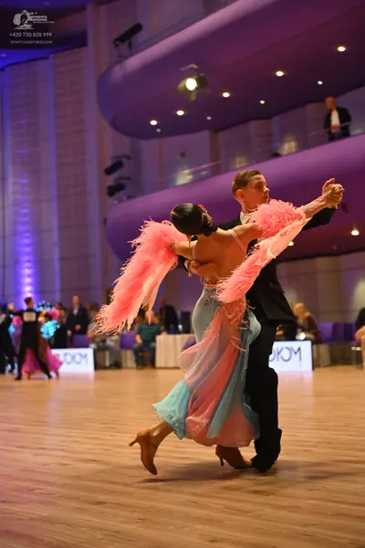 Dancesport competitor: Male dancer: black suit