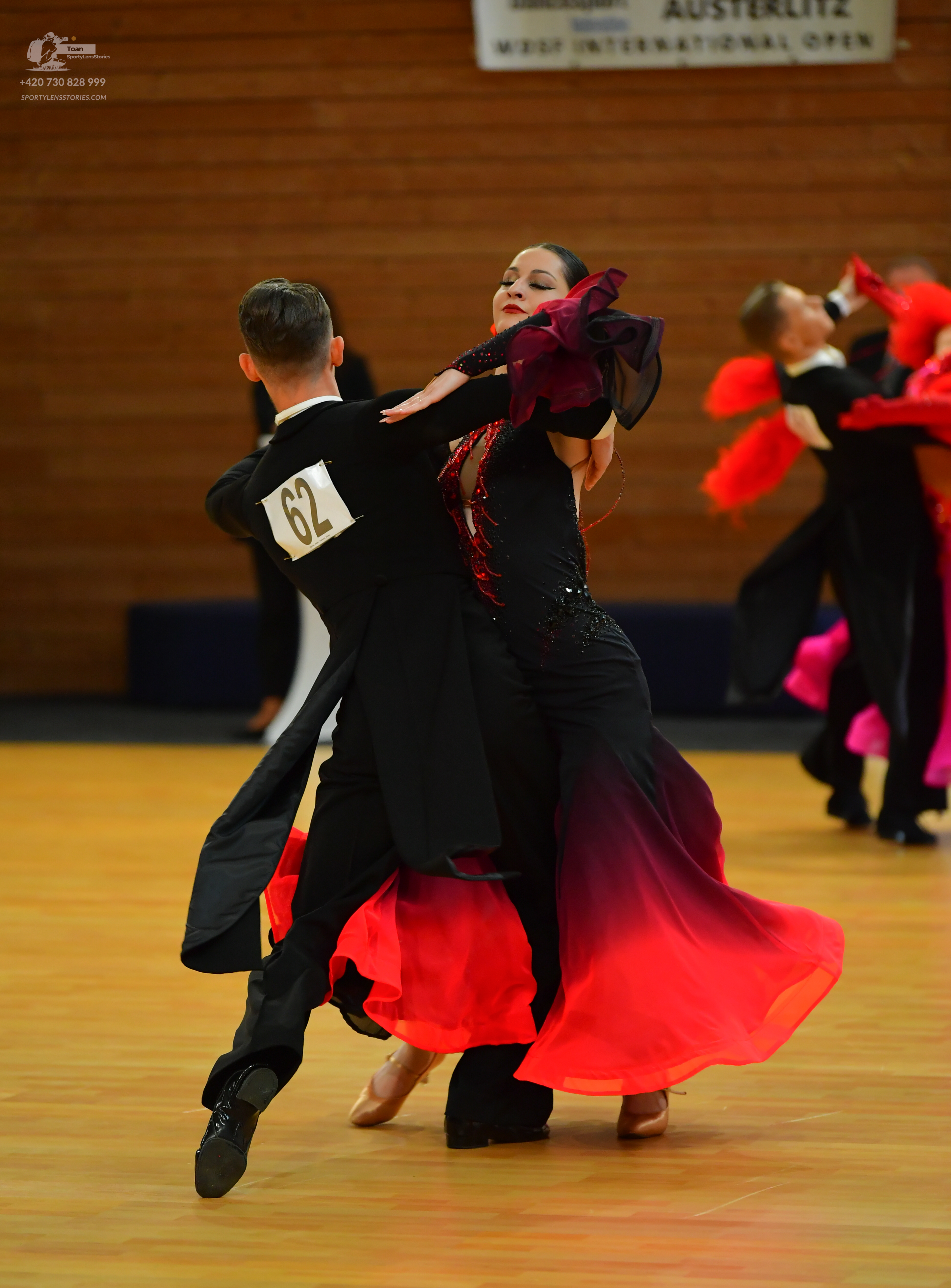 Dancesport competitor: Male**

*   **Color:** Black
*   **Fabric:** Primarily sequins, with a satin or 