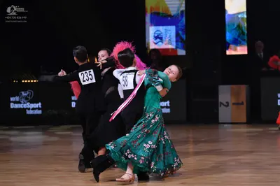 Dancesport competitor: Male dancer: black suit