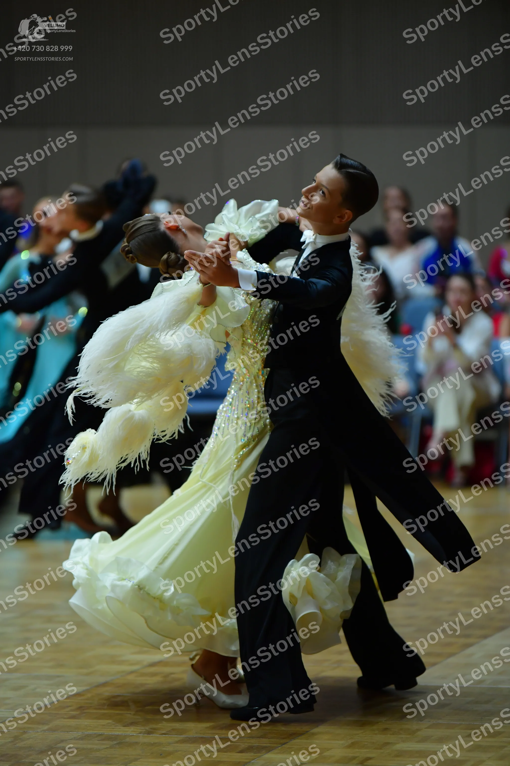 Dancesport competitor: Male dancer: black tailcoat with a white shirt and black bow tie
