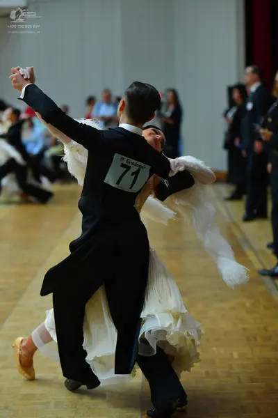 Dancesport competitor #71: Male dancer: black ballroom tailcoat suit