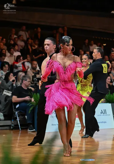Dancesport competitor #21: Male dancers: black latin dance shirts and trousers