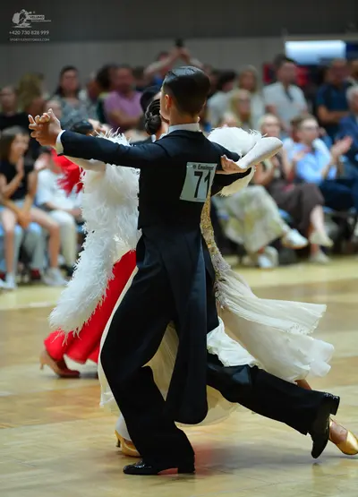 Dancesport competitor #71: Male dancer: black suit