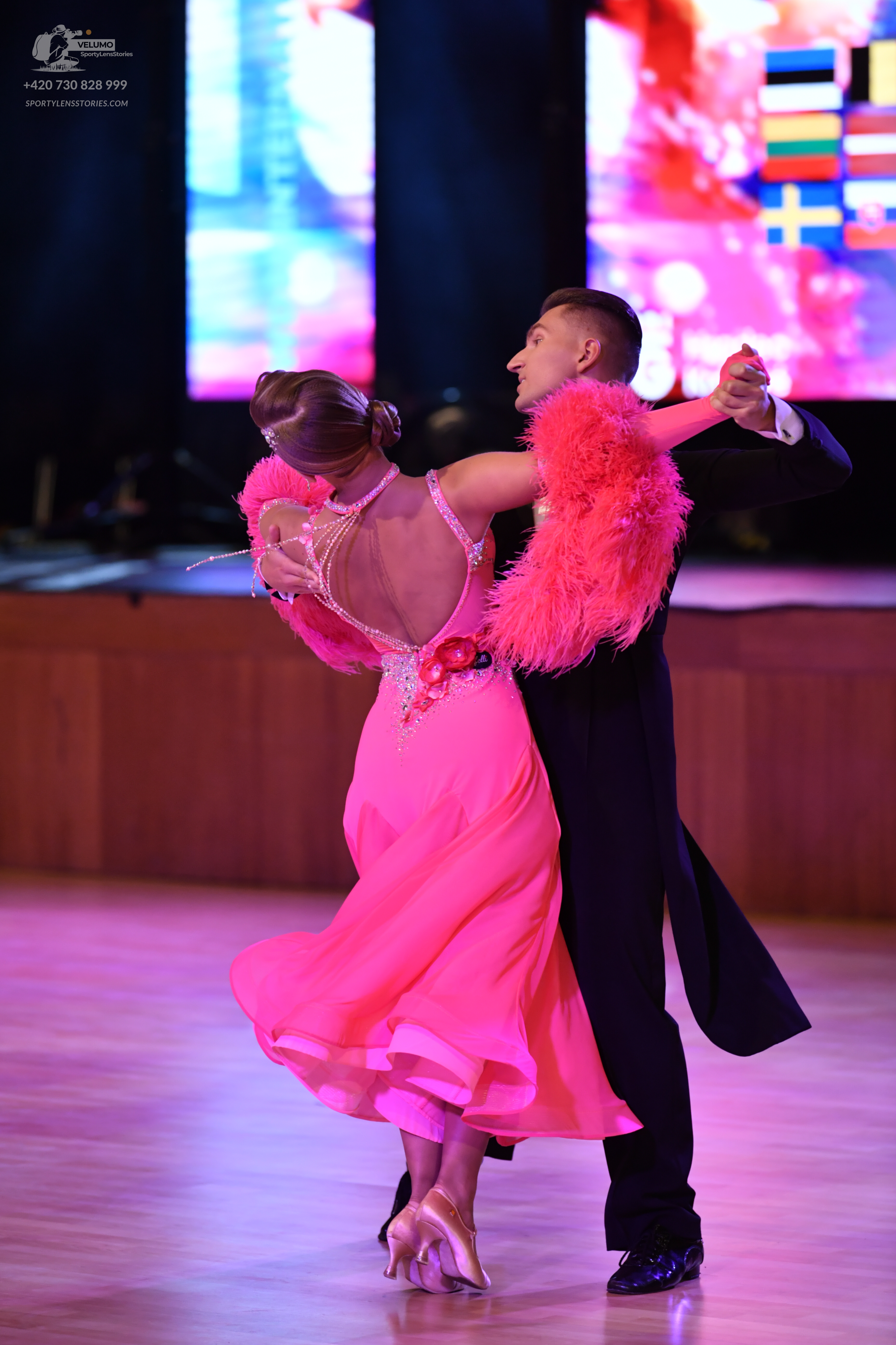 Dancesport competitor: Male dancer: black ballroom/standard dance suit with a white shirt