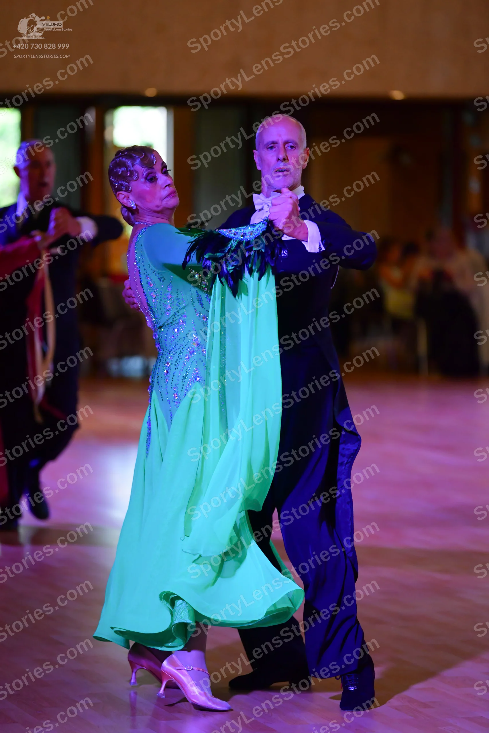 Dancesport competitor: Male** 
*   **Color:** Black 
*   **Fabric:** Tail suit with sequin lapels