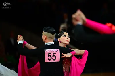 Dancesport competitor #55: Male dancer: black long-sleeved shirt