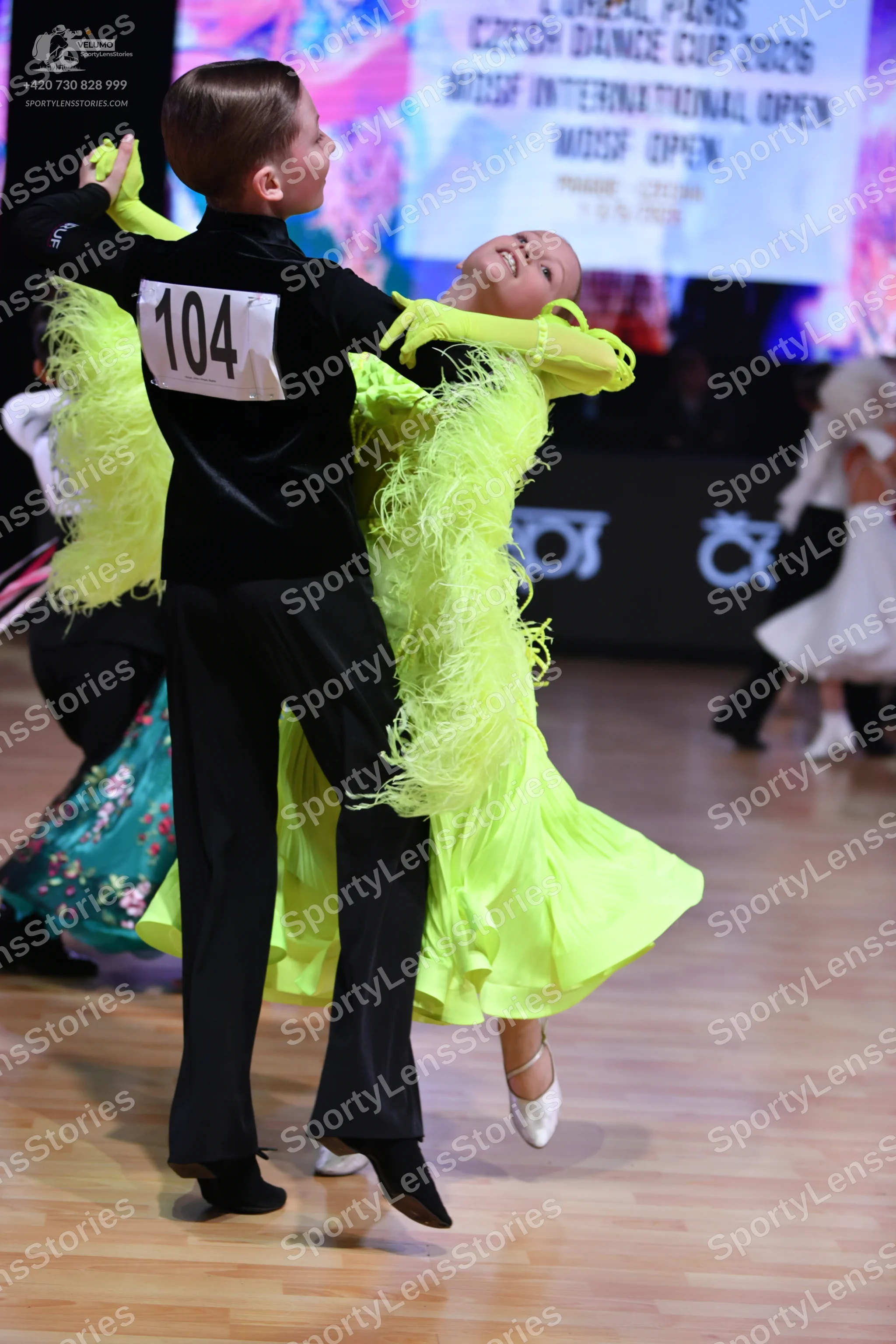 Dancesport competitor: Male dancer: black long-sleeved shirt and black trousers