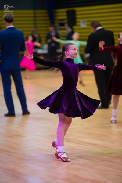Dancesport competitor: ** Red Latin dress