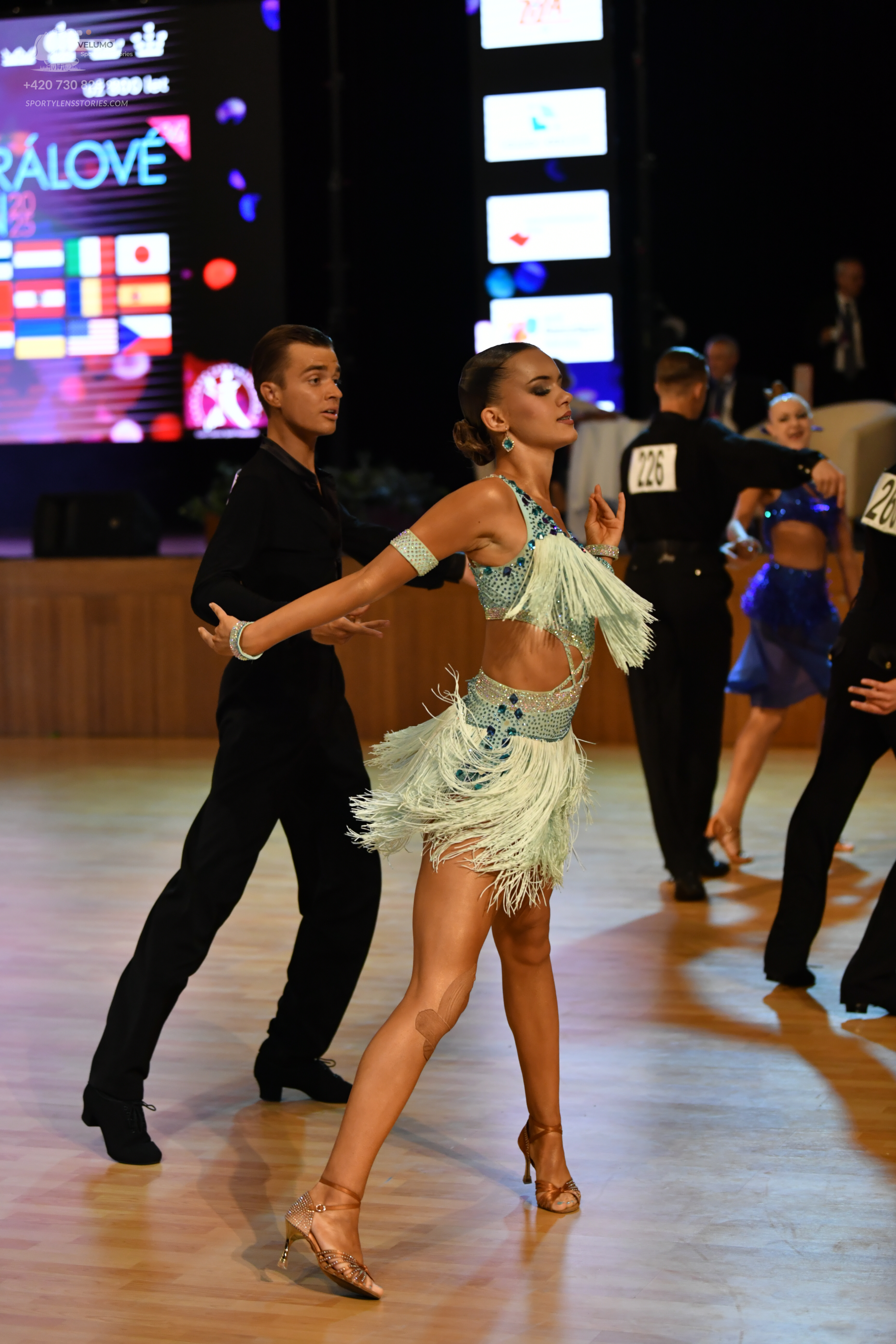 Dancesport competitor: ** Black tail suit