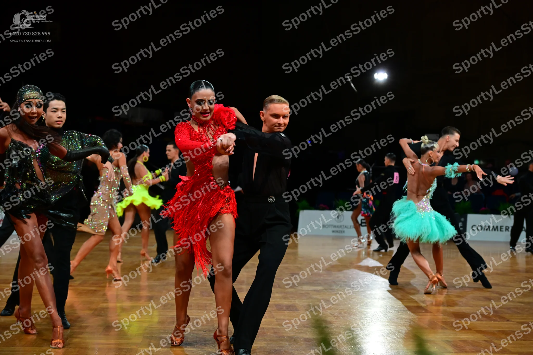Dancesport competitor: Female dancer: black sequin latin dress