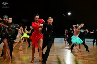 Dancesport competitor: Female dancer: black sequin latin dress