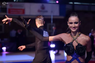 Dancesport competitor: Male dancer: black suit