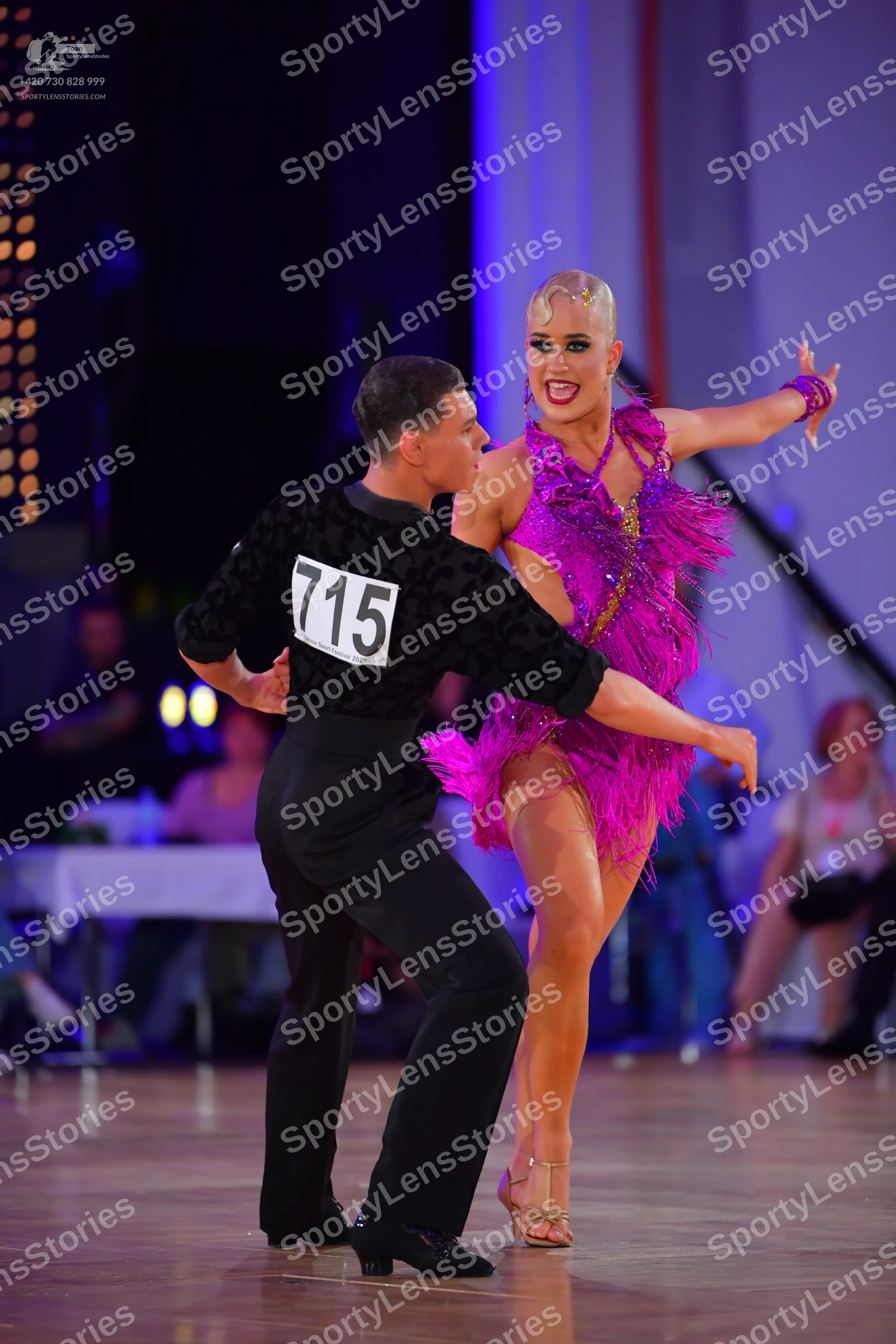 Dancesport competitor #715: Male dancer: black long-sleeved textured shirt and black trousers