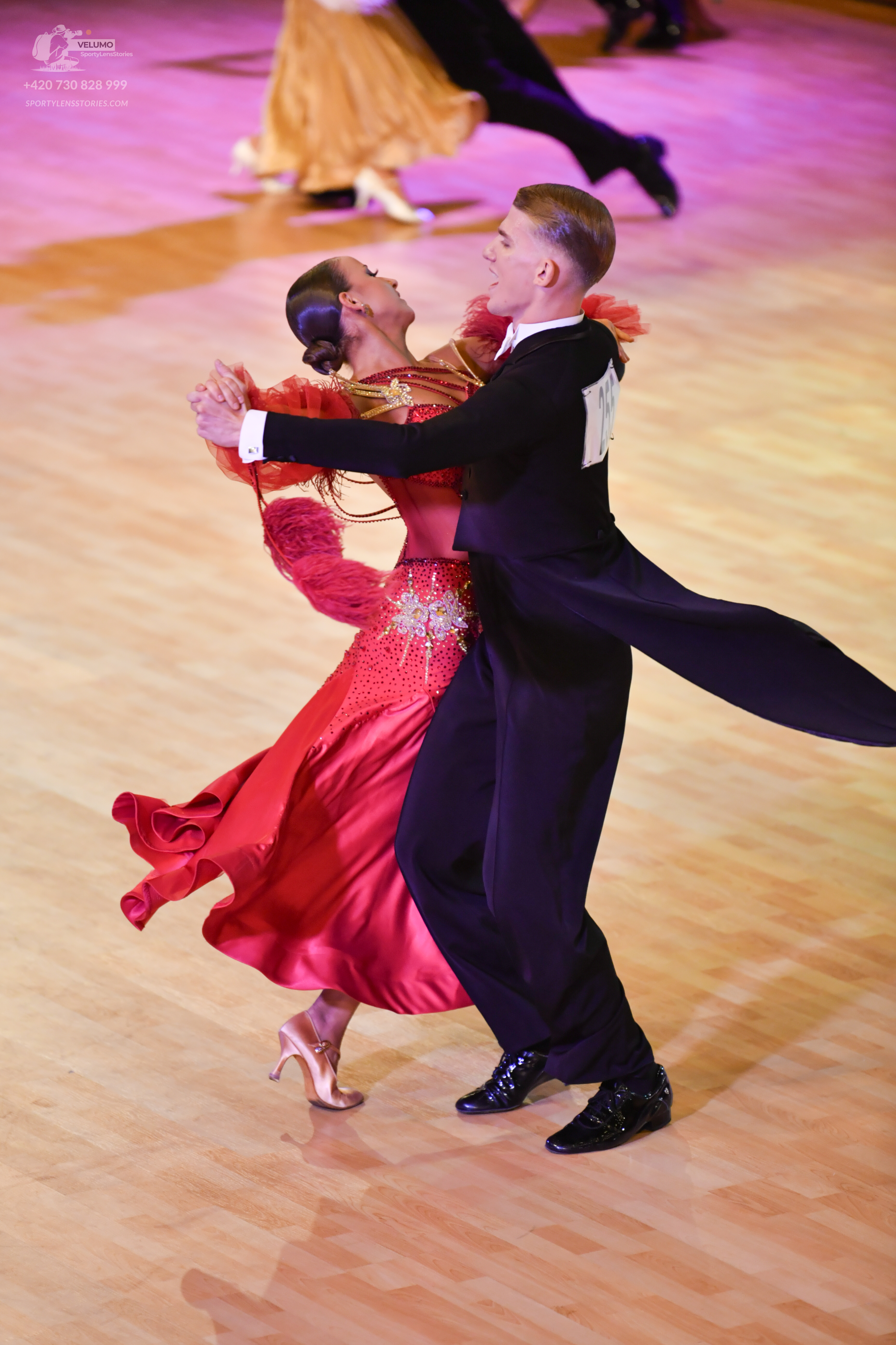 Dancesport competitor: Male:**
*   **Color:** Black
*   **Fabric:** Tail suit with sequins