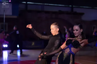 Dancesport competitor #145: Male dancer: black long-sleeved dance top