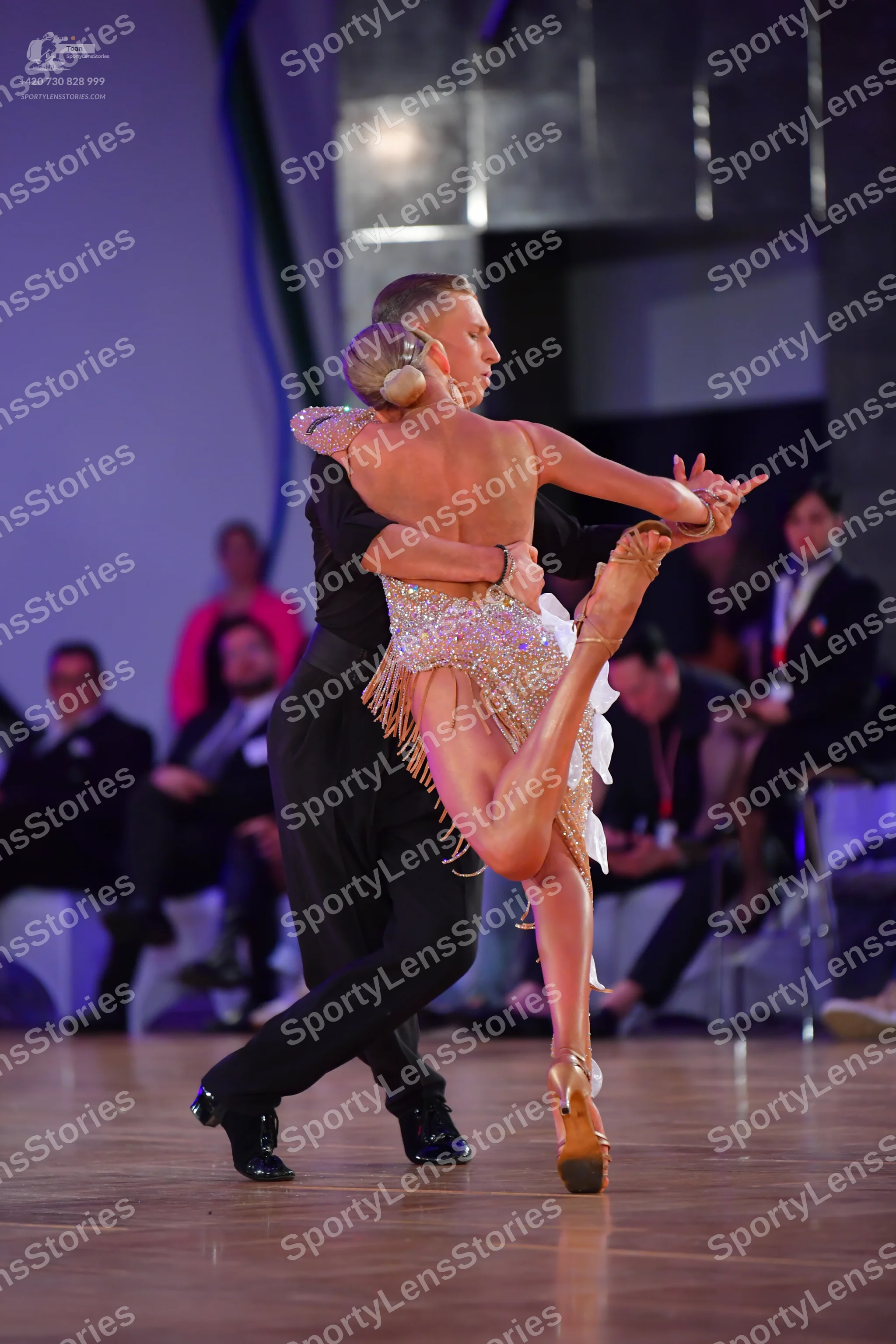 Dancesport competitor: Male dancer: black long-sleeved shirt and black trousers