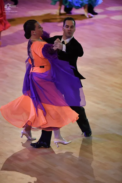 Dancesport competitor: ** Black tailsuit