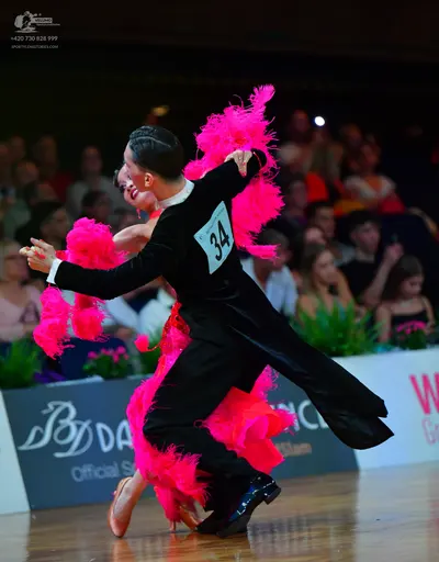 Dancesport competitor #34: Male dancer: black long-sleeved top and black trousers