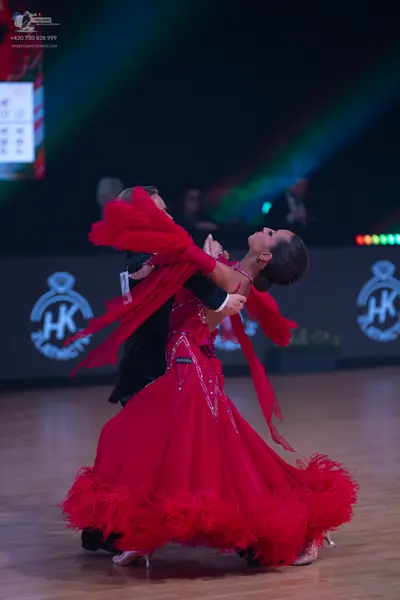 Dancesport competitor: Male dancer: black suit