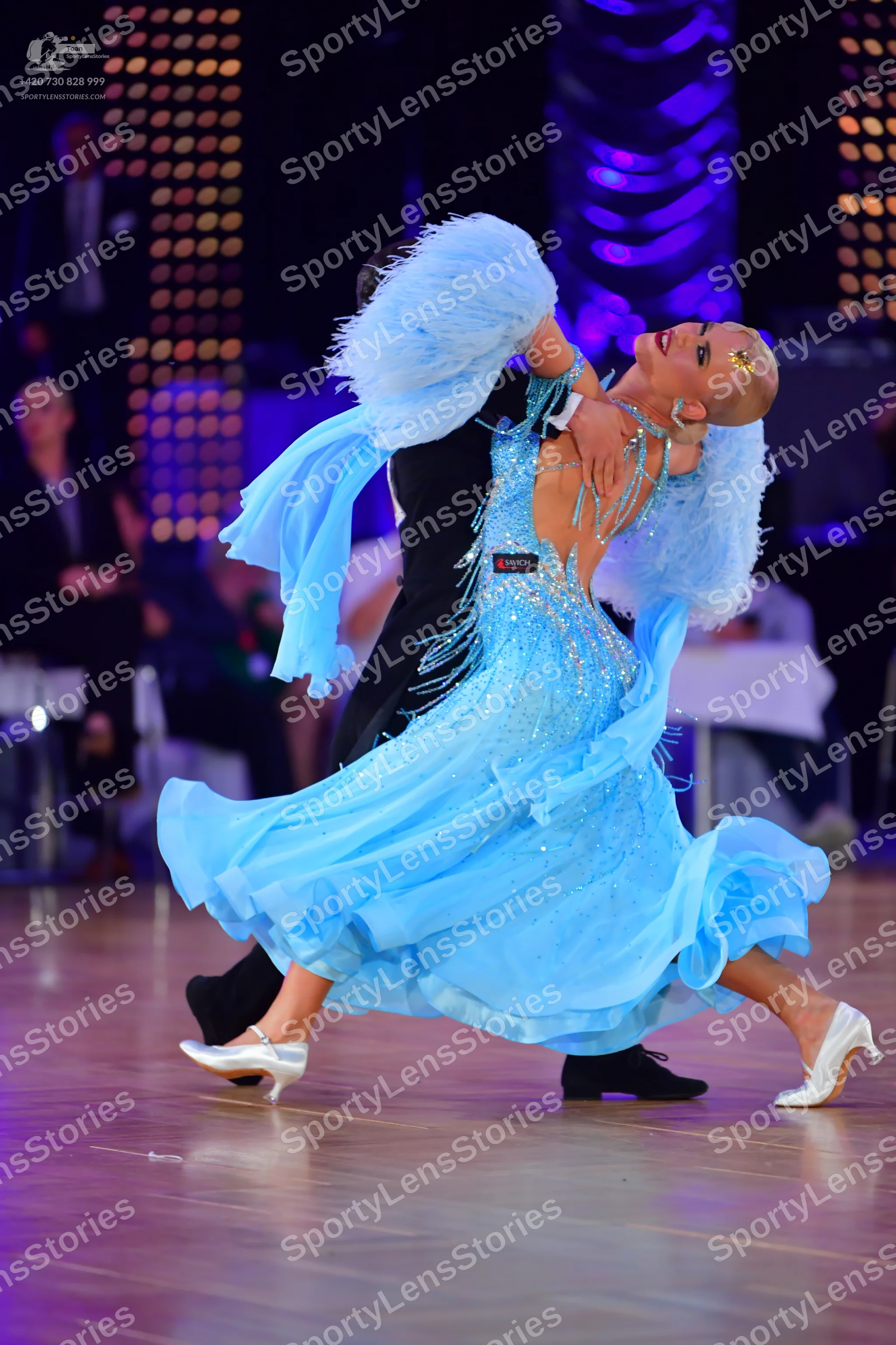 Dancesport competitor: Male dancer: black suit and black dance shoes