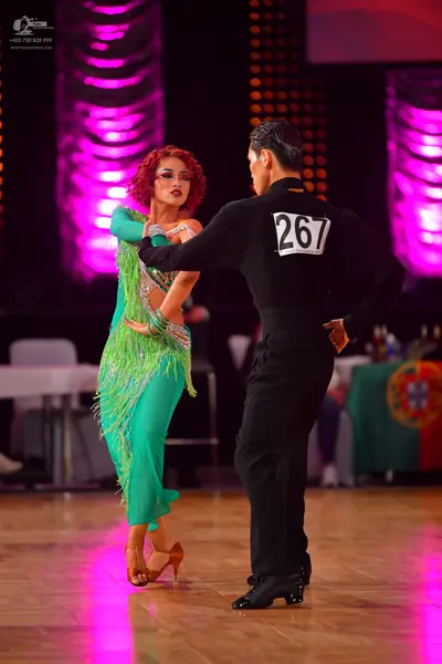 Dancesport competitor #267: Male dancer: black long-sleeved shirt and black trousers