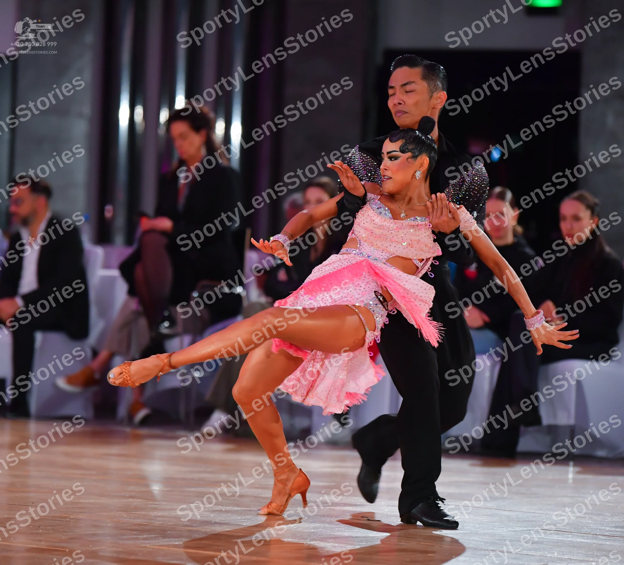 Dancesport competitor: Male dancer: black long-sleeved dance shirt and black trousers