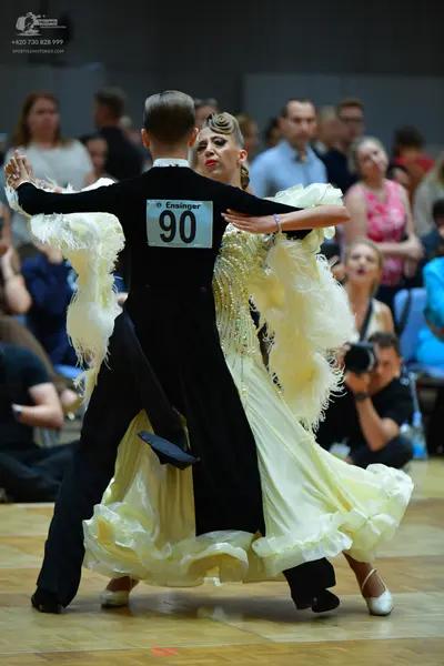 Dancesport competitor #90: Male dancer: black long-sleeved shirt and black trousers
