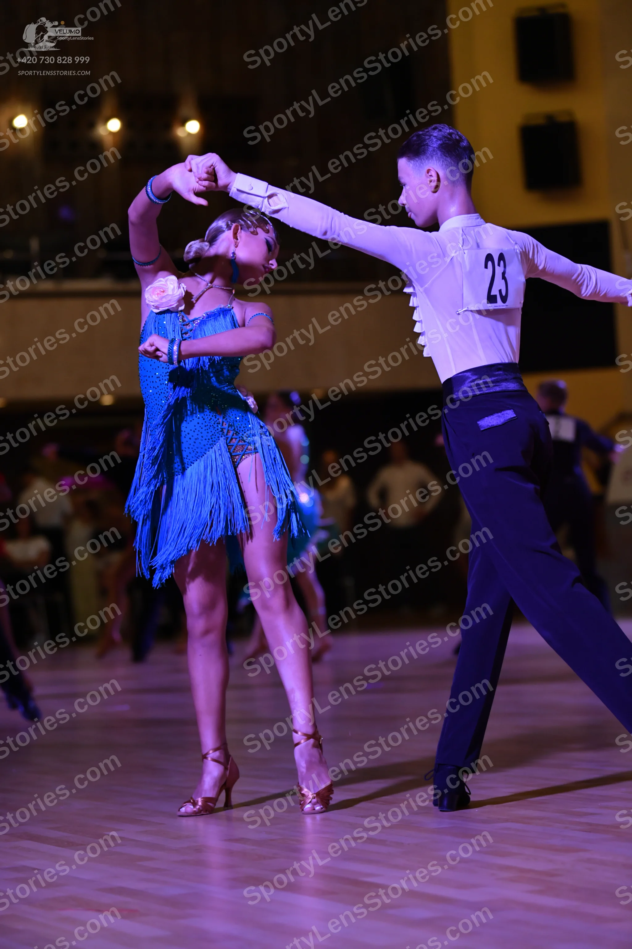 Dancesport competitor #23: ** Black suit with a shimmering, sequined lapel