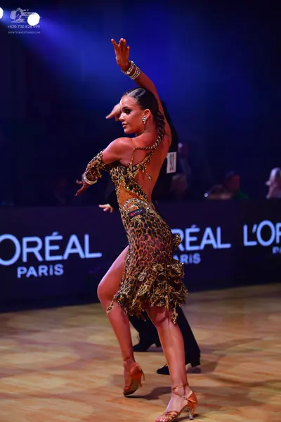 Dancesport competitor: Male dancer: black suit