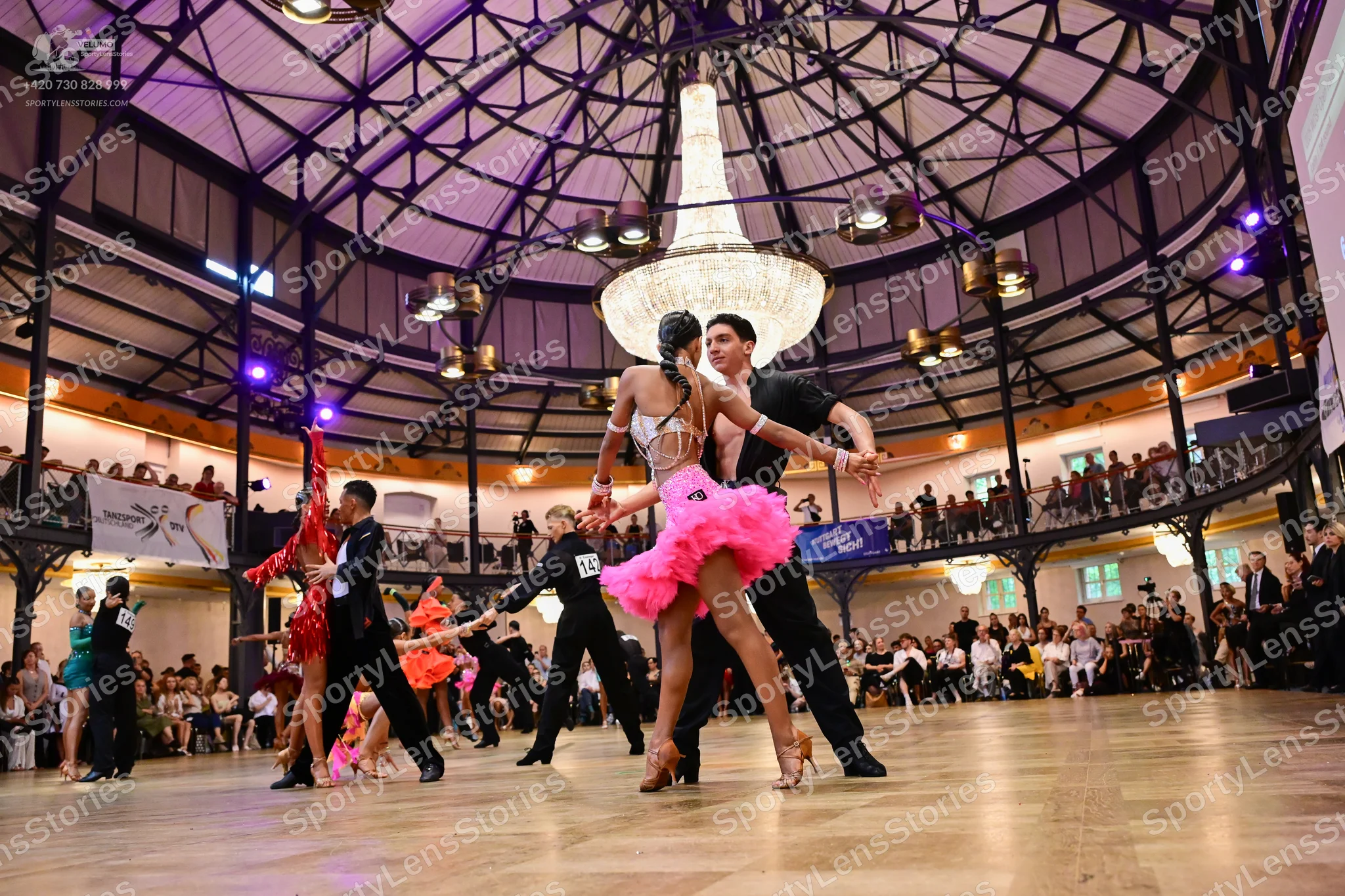 Dancesport competitor #14: Male dancers: black shirts and black trousers