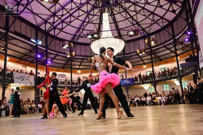 Dancesport competitor #14: Male dancers: black shirts and black trousers