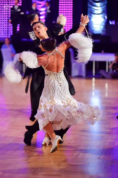 Dancesport competitor #78: Male dancer: black suit