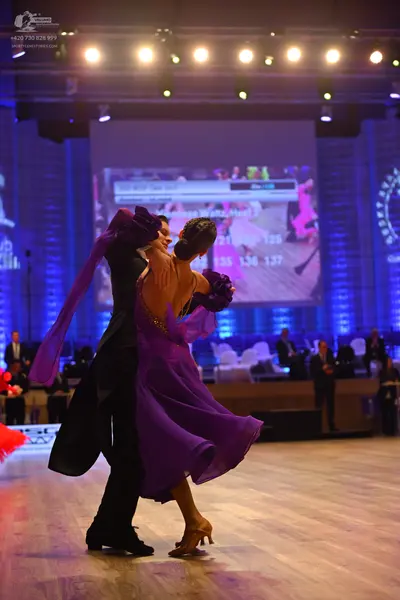 Dancesport competitor: Male dancer: black ballroom tailcoat and trousers