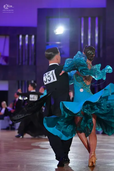 Dancesport competitor #351, #141: Male dancer: black suit