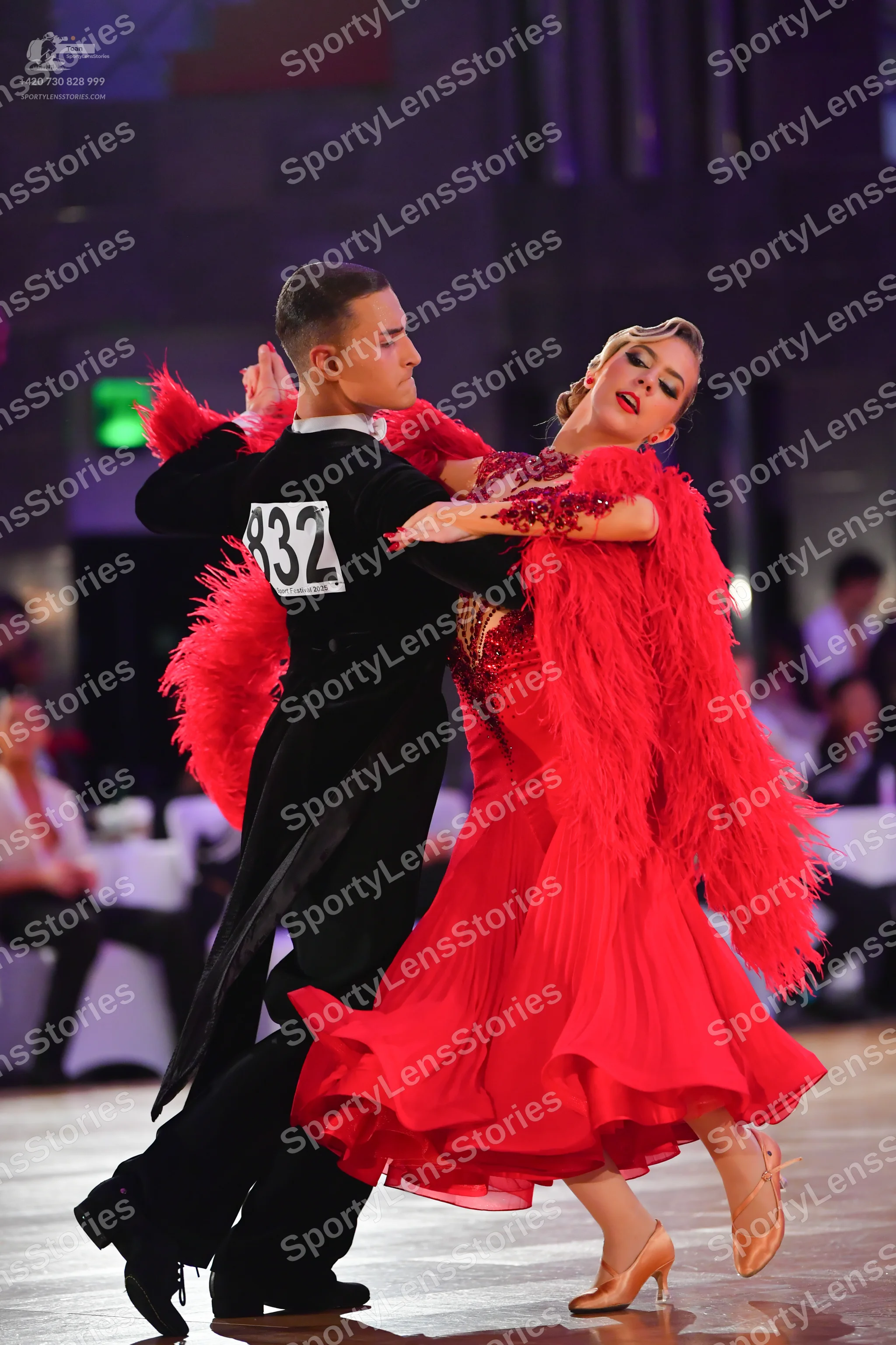 Dancesport competitor #832: Male dancer: black dance suit with long tails and a white collar