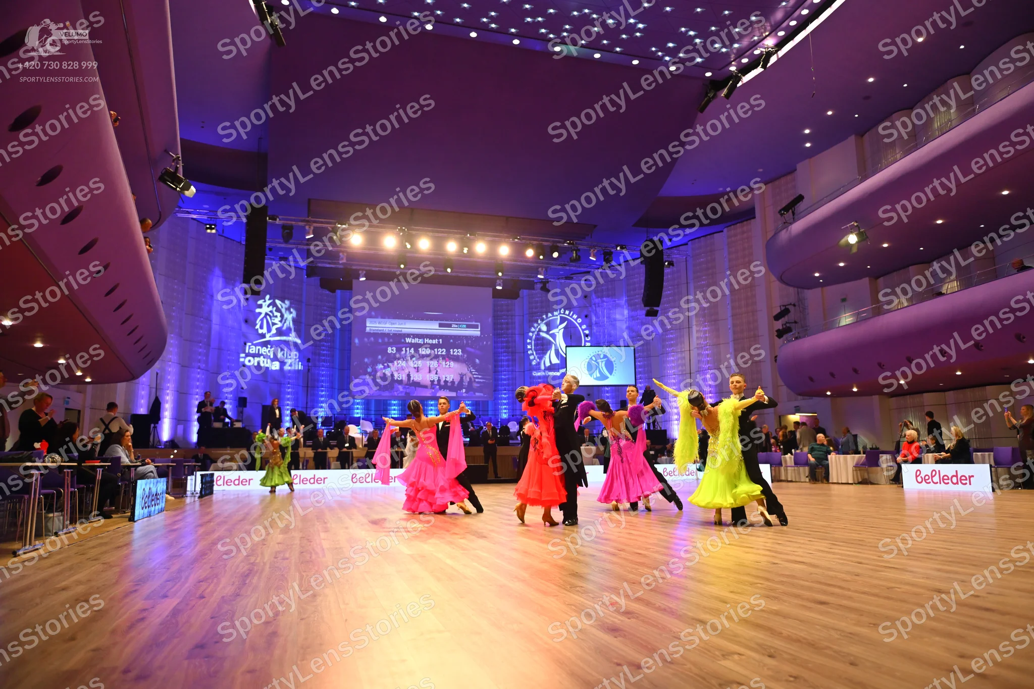Dancesport competitor: Female dancer: pink latin dress with long fringe