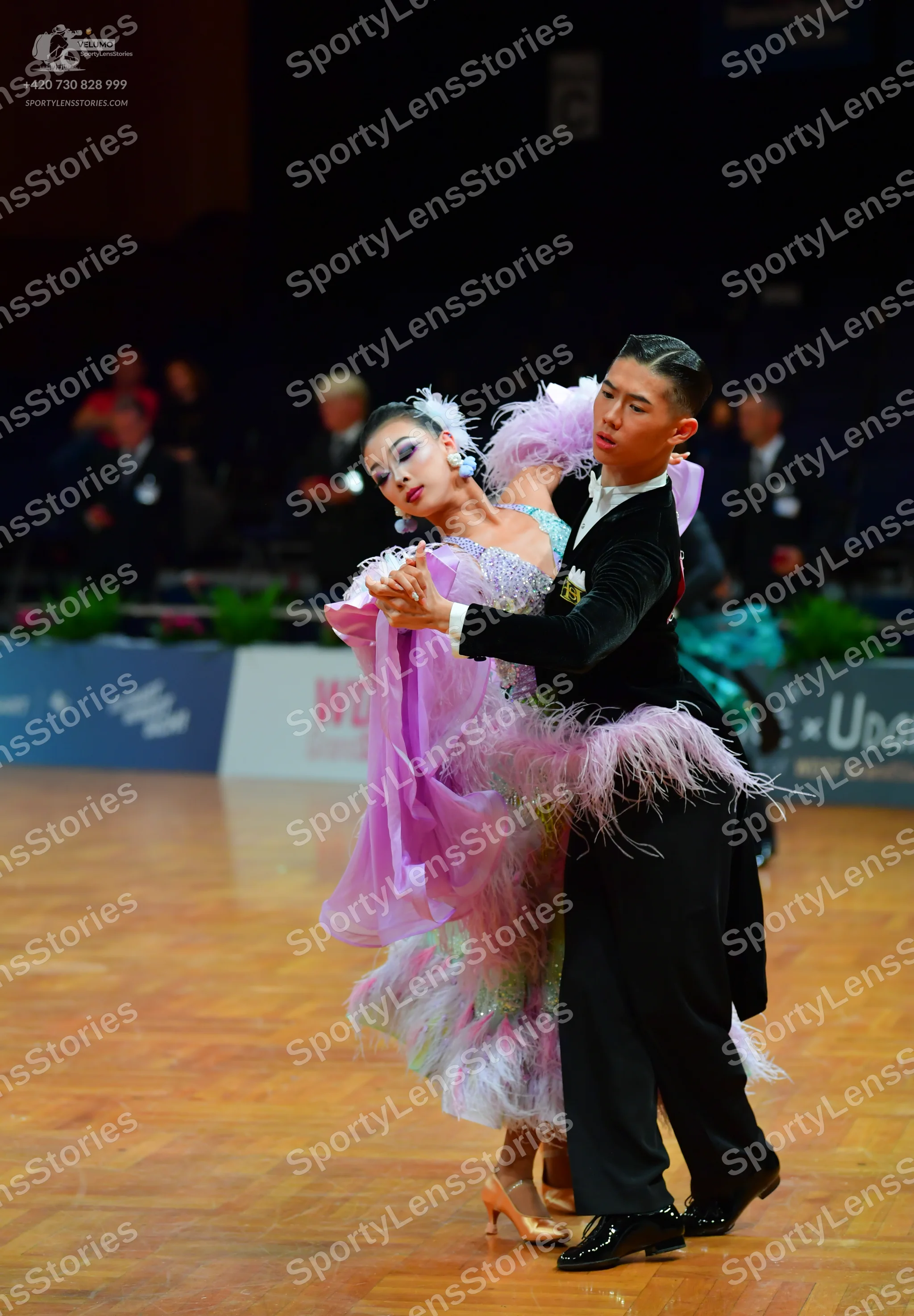 Dancesport competitor: Male dancer: black ballroom dance suit