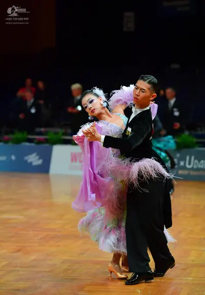 Dancesport competitor: Male dancer: black ballroom dance suit