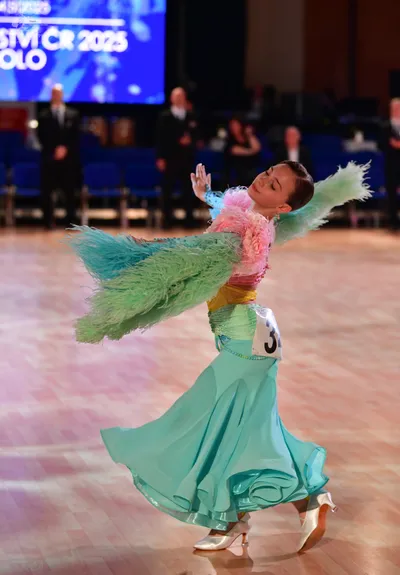 Dancesport competitor: Female dancer: light aqua/mint green ballgown with a voluminous flowing skirt, f