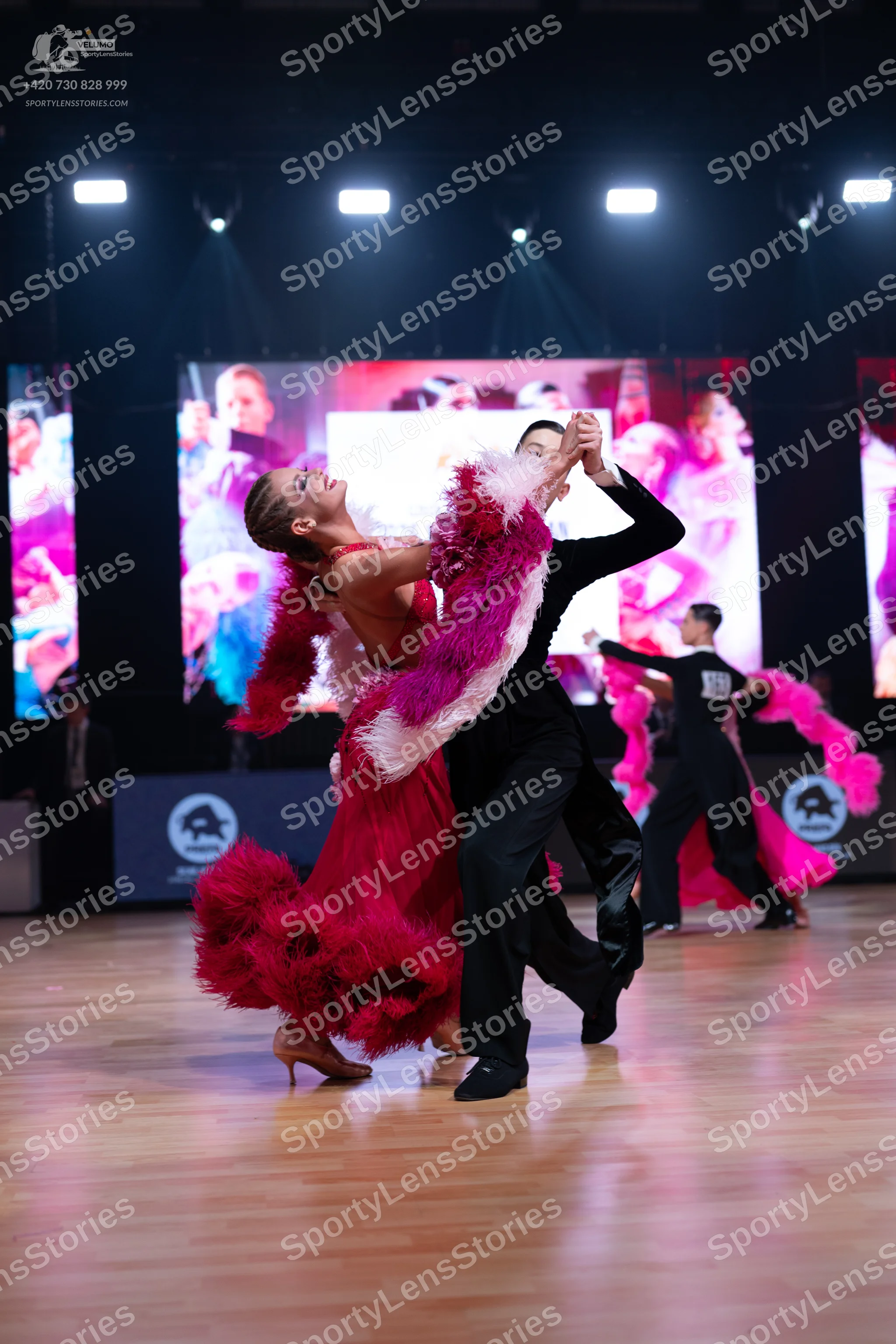 Dancesport competitor: Male dancer: black long-sleeved shirt and black trousers