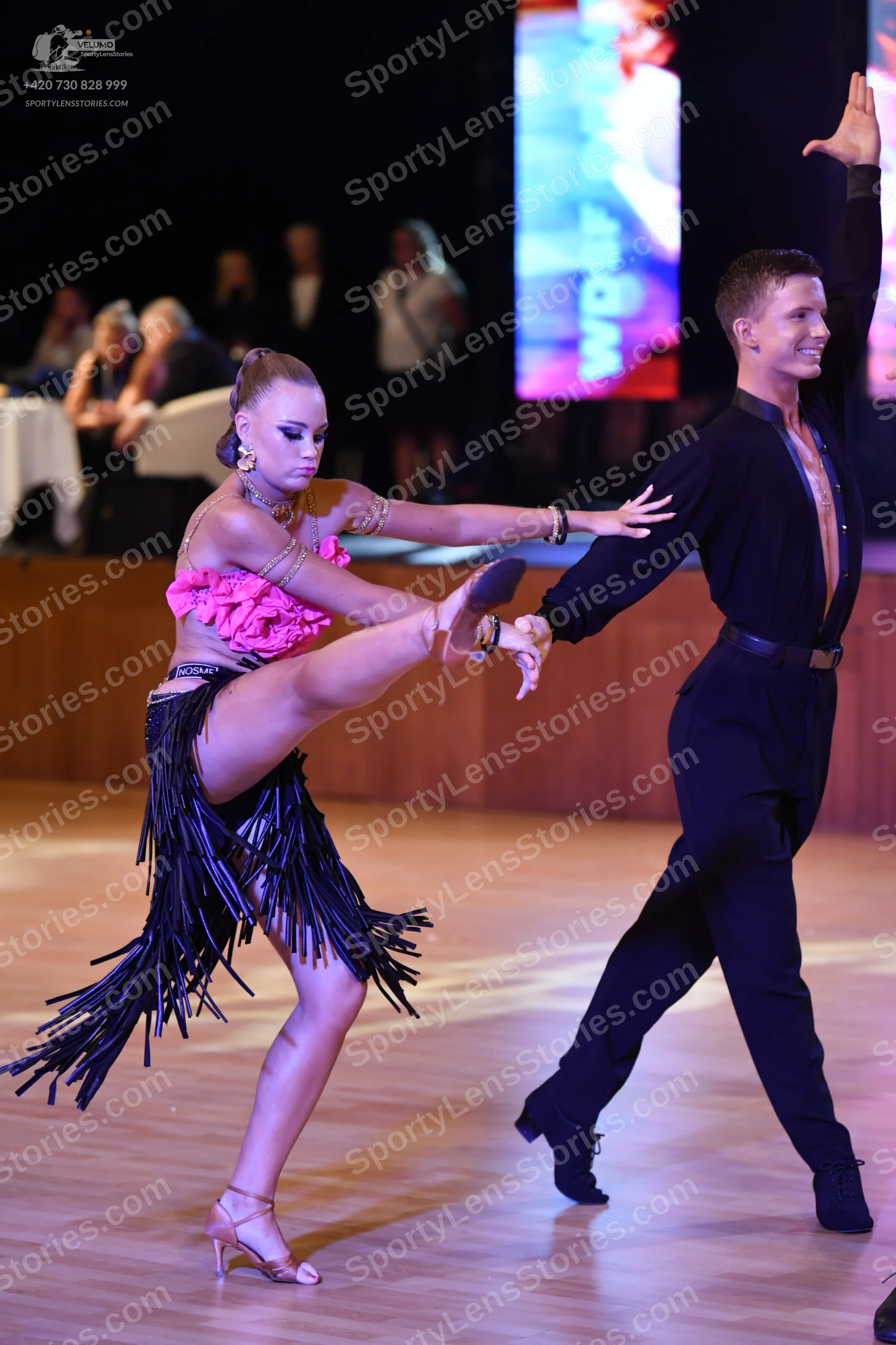 Dancesport competitor: ** Red Latin dress
