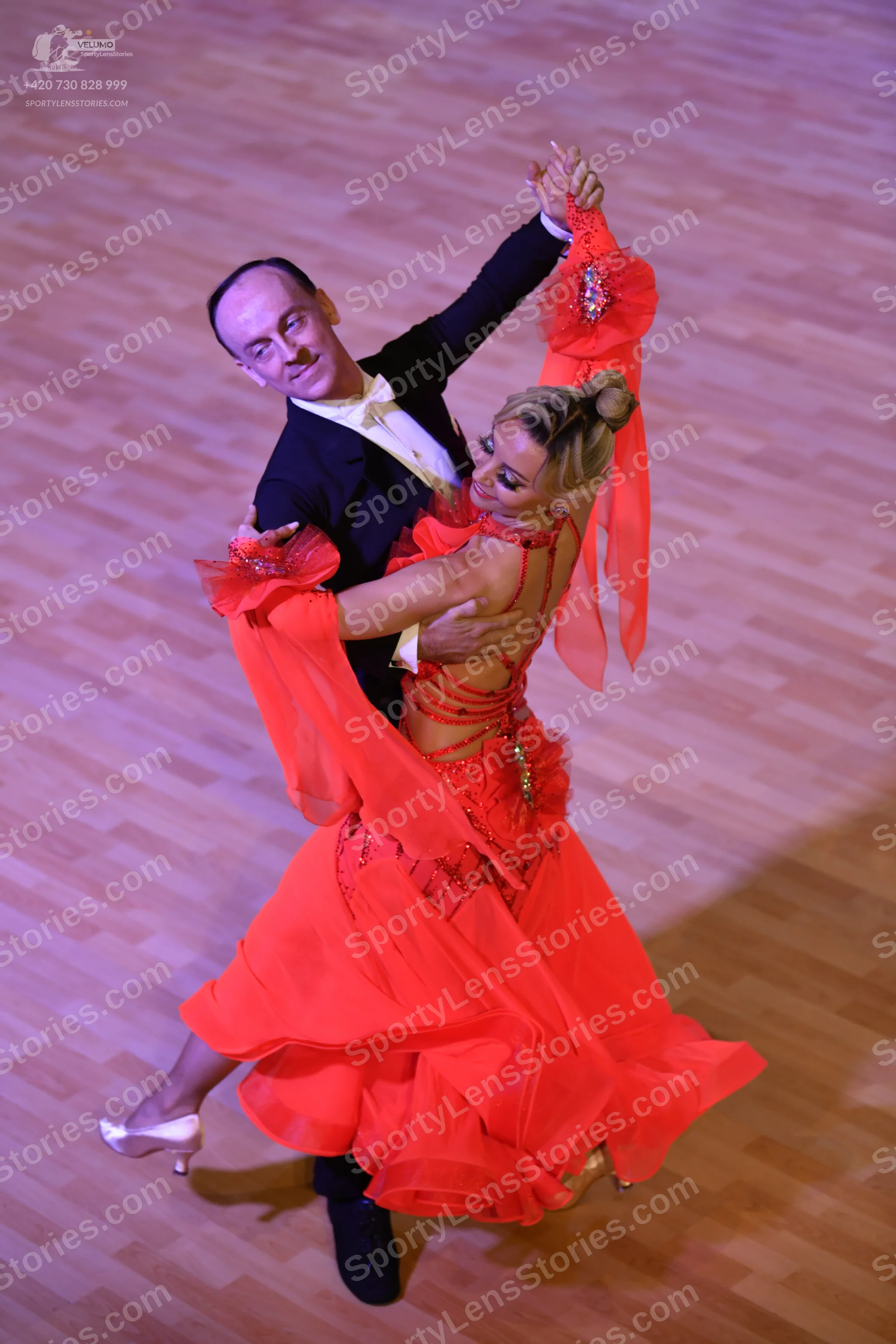 Dancesport competitor: ** Male: Black tailsuit with black trousers and a black jacket
