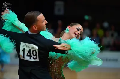 Dancesport competitor #149: Male dancer: black long-sleeved top
